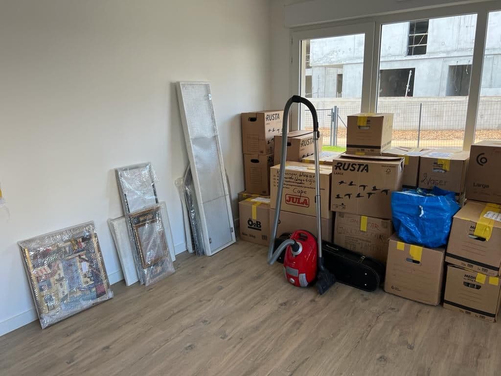 Sorted boxes and belongings ready for a planned estate clearance