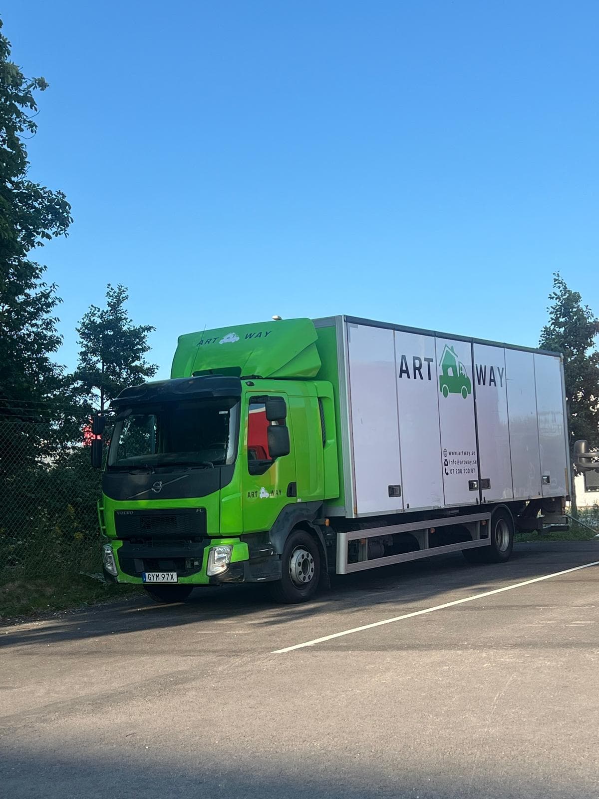 Artway branded moving trucks ready for transport